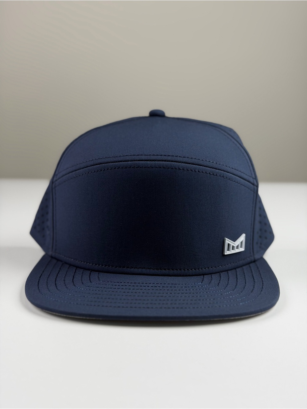 Melin Trenches Icon Hydro Performance Snapback Hat in Navy, Classic